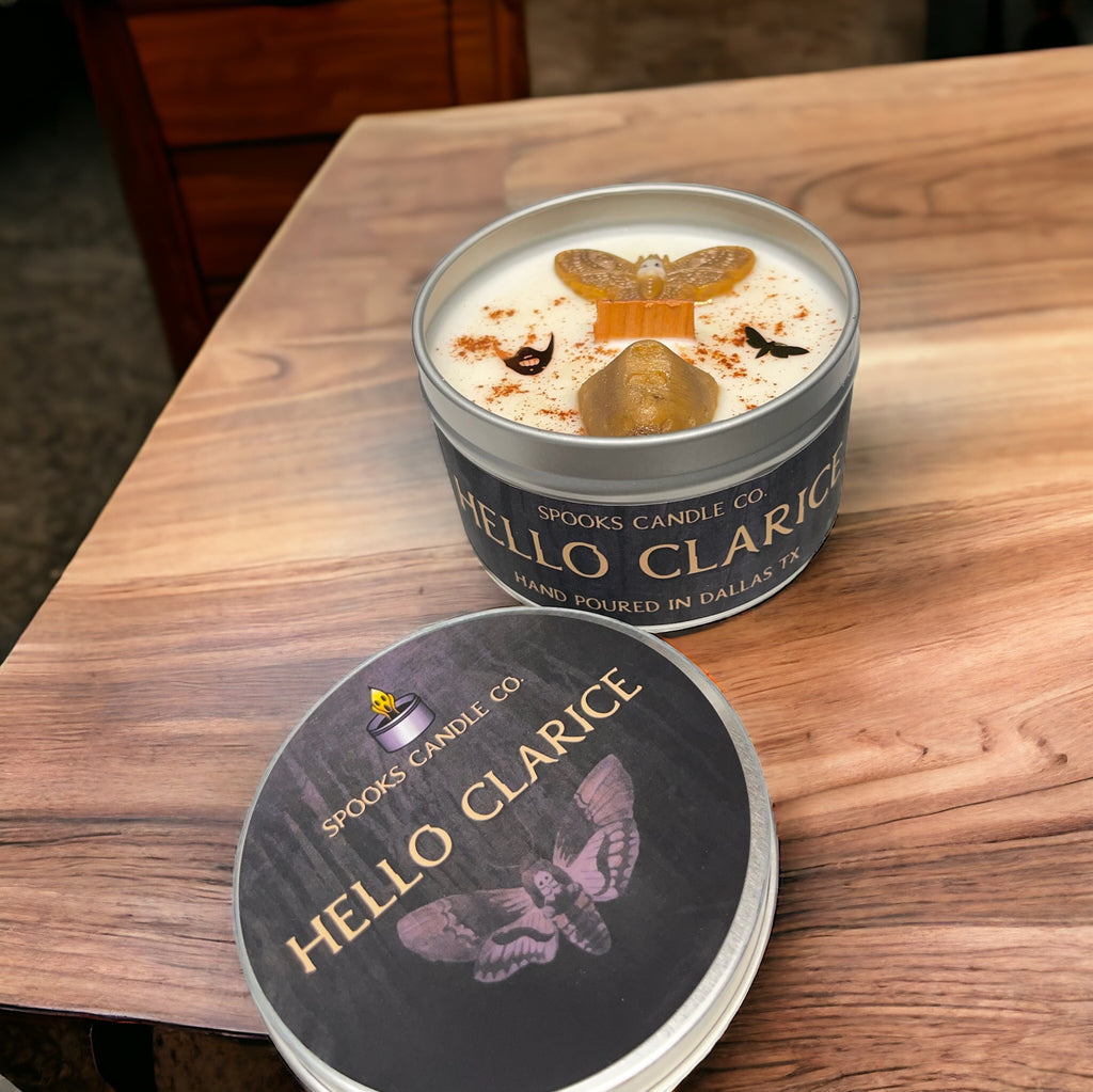 Hello Clarice soy wax candle inspired by Silence of the Lambs with death moth, aged leather scent, and sophisticated design.